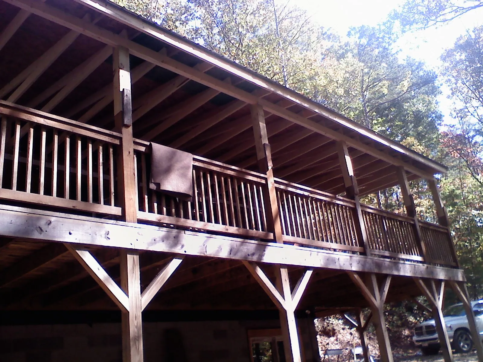 Timber framing under a new elevated porch and deck — Roof Leak Repair in Maple Valley by Roofing Brothers